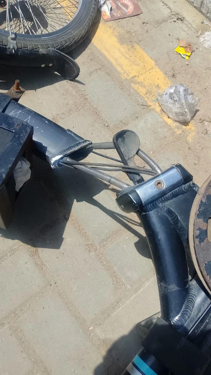 Close-up of a failed folding joint on a delivery e-bike used by a rider interviewed by Shortmile.